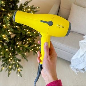 Never used. Drybar buttercup hair dryer